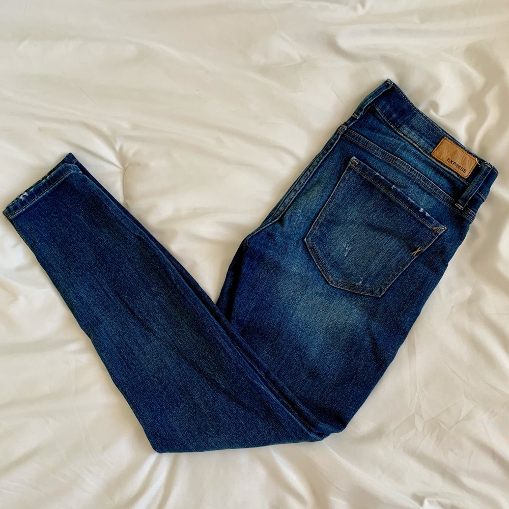 Express distressed skinny jeans